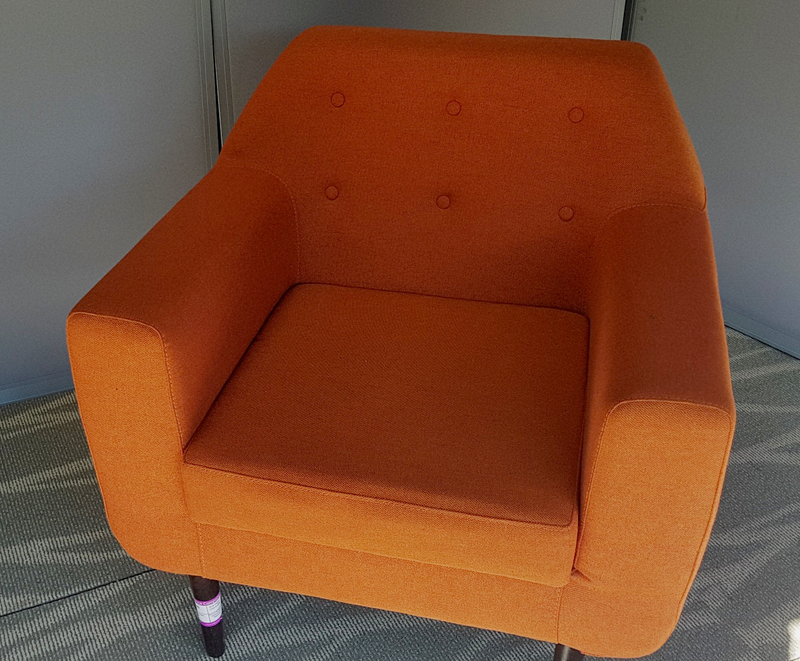 Low back orange lounge chair
