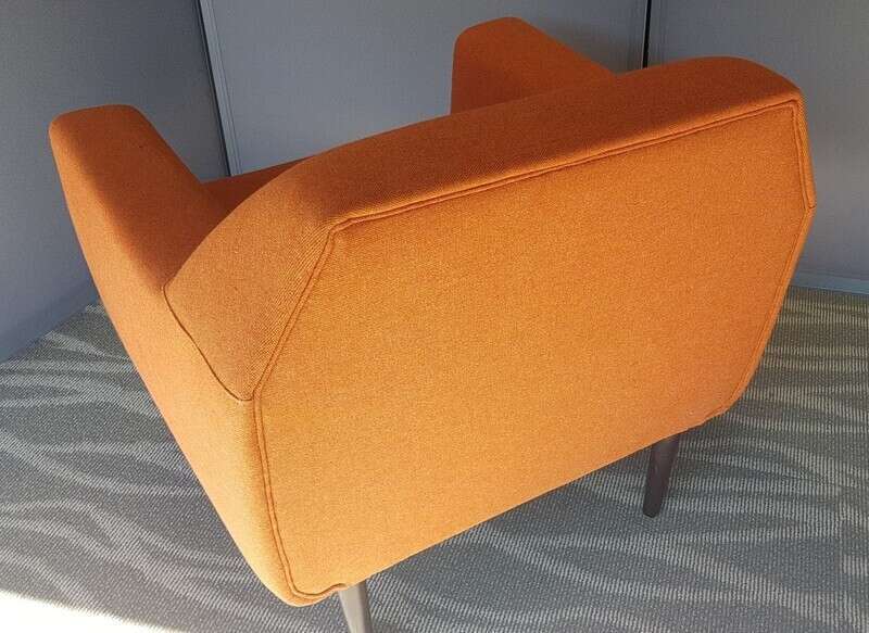 Low back orange lounge chair