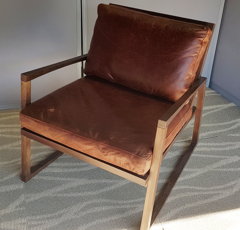 Brown leather armchairs