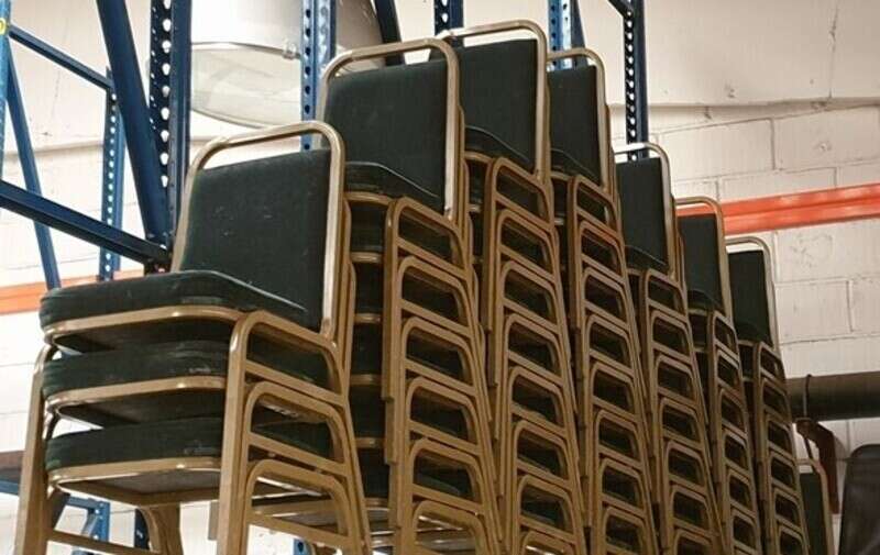 Green stacking chairs