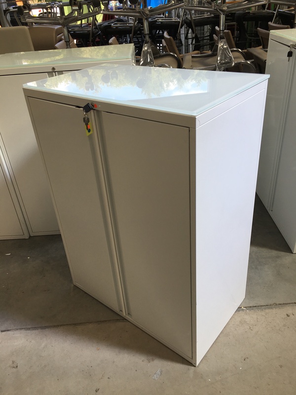 1080mm high white metal cupboards with glass tops