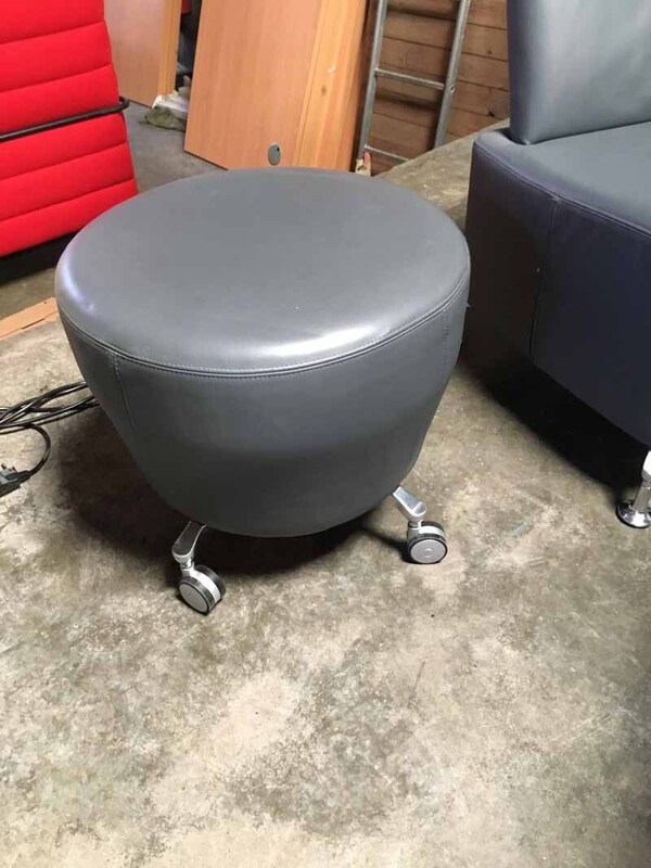 Grey leather Orangebox Point mobile stools