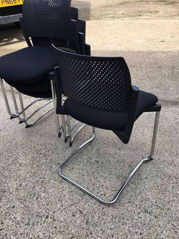 Black Torasen Kyos plastic back stacking chairs