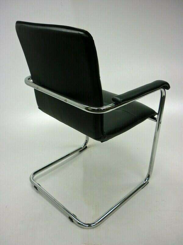 Black and chrome cantilever chairs