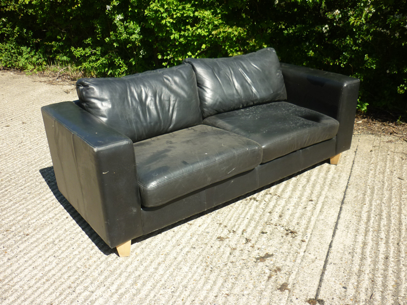 Black leather 2 seater sofa