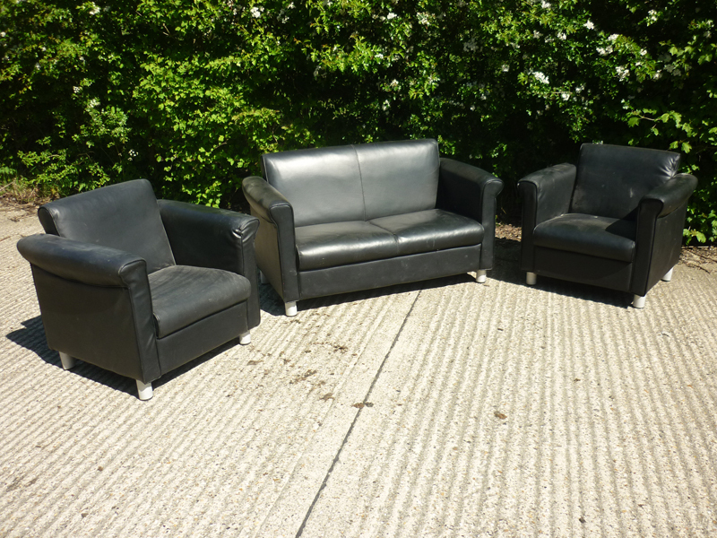 Black leather sofa and armchairs