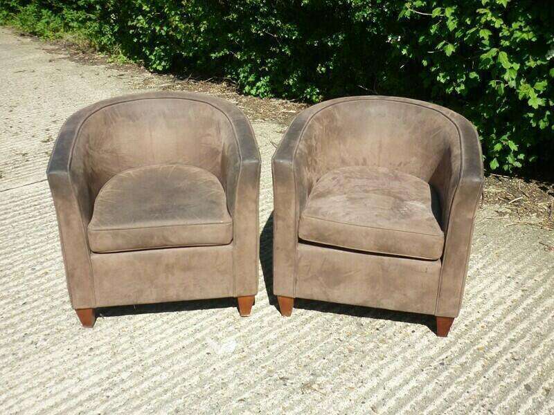 Brown suede Boss Design tub chairs