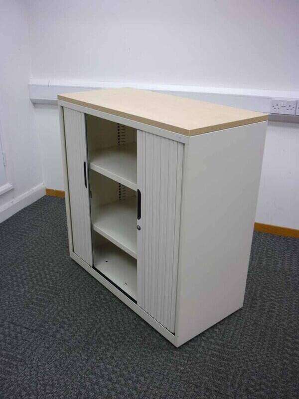 1000mm high cream Bisley tambour cupboards with maple top
