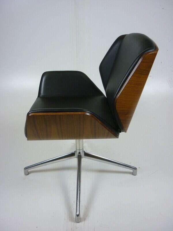 Black leather Boss Design Kruze chairs with walnut back