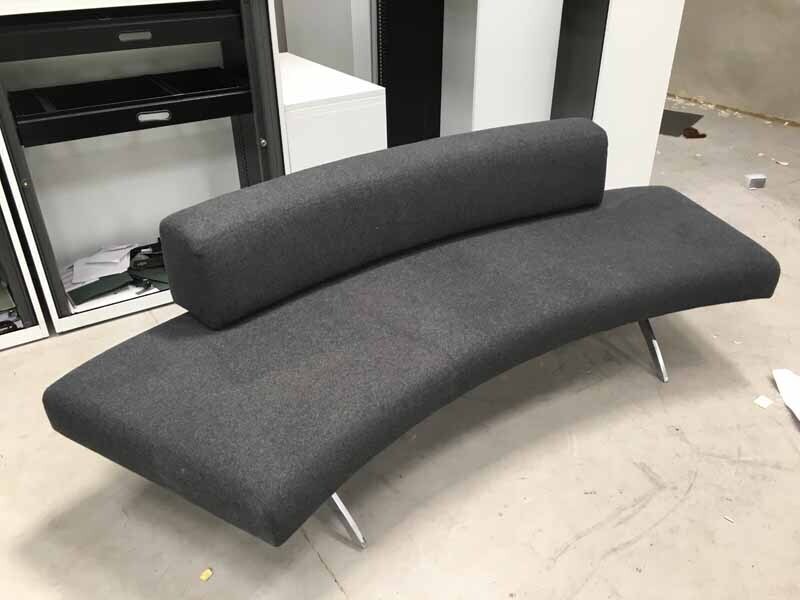 Grey curved sofa