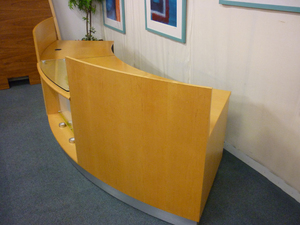 Ash veneer curved reception desk
