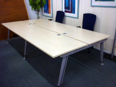 Pale maple bench desk systems. (CE) Per person: