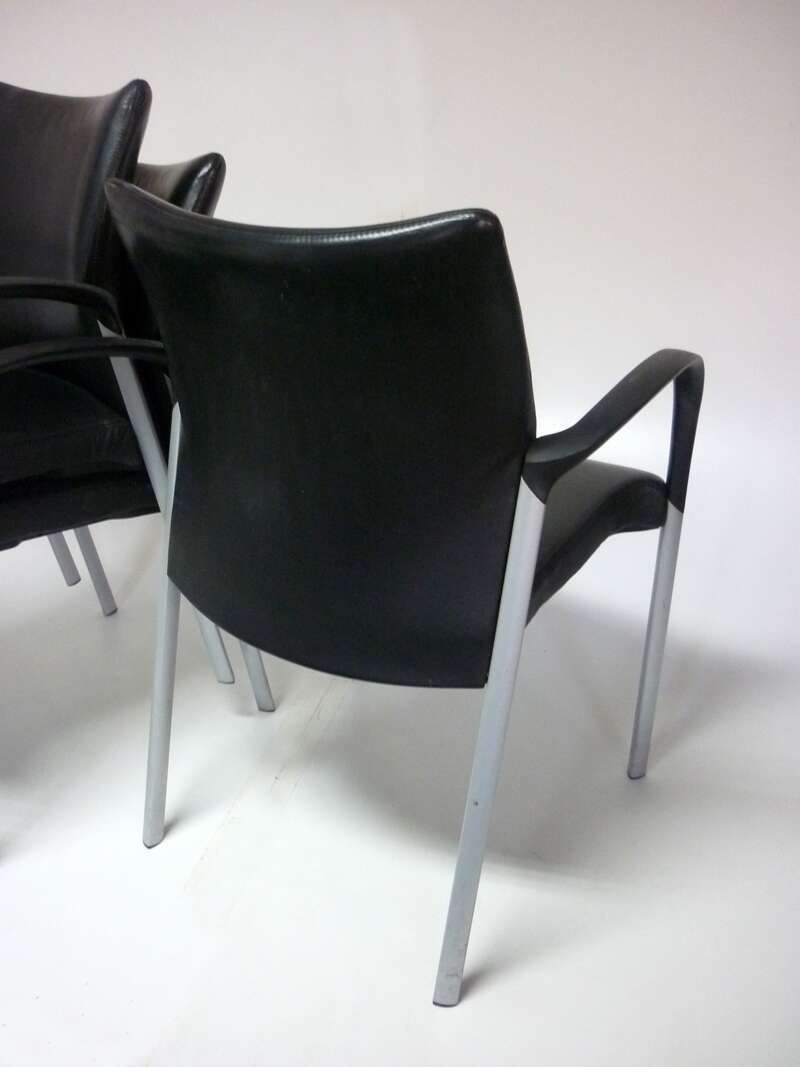 Black leather Senator Trillipse stacking chairs