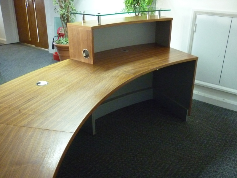 Light walnut curved reception desk