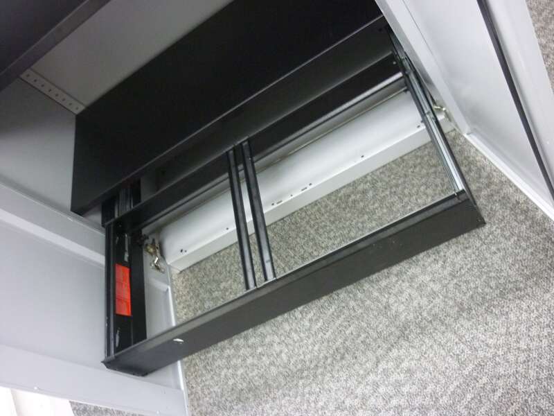 1325mm high Steelcase silver/maple metal cupboards