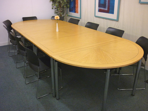 Hartley oak veneer conference table set