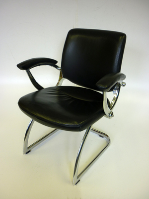 Black leather chrome cantilever armchairs