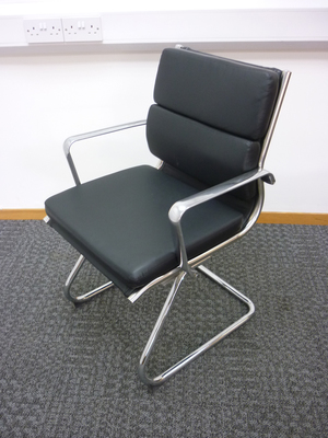 Black leather split back meeting chairs