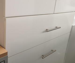 White double cupboard with drawers