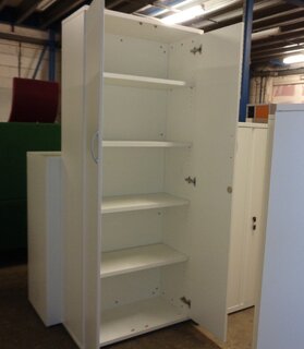 Tall white wooden cupboard