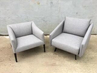 Andreu World Couveacute grey armchairs