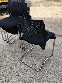 Black Torasen Kyos plastic back stacking chairs