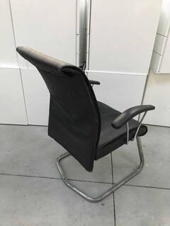 Black leather chunky cantilever meeting chairs