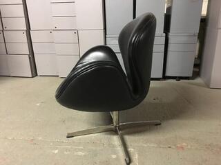Funky black leather bucket chairs
