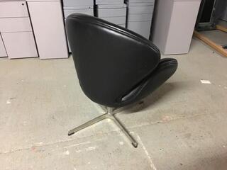 Funky black leather bucket chairs