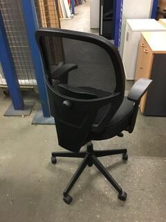 Black mesh back operator chairs
