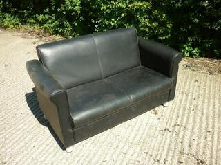 Black leather sofa and armchairs suite