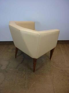 Light brown leather tub chair