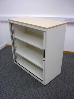 1000mm high cream Bisley tambour cupboards with maple top