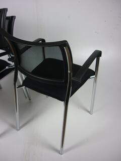 Black mesh back stacking chairs