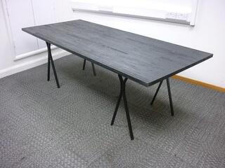 Rustic black S-shape poseur table
